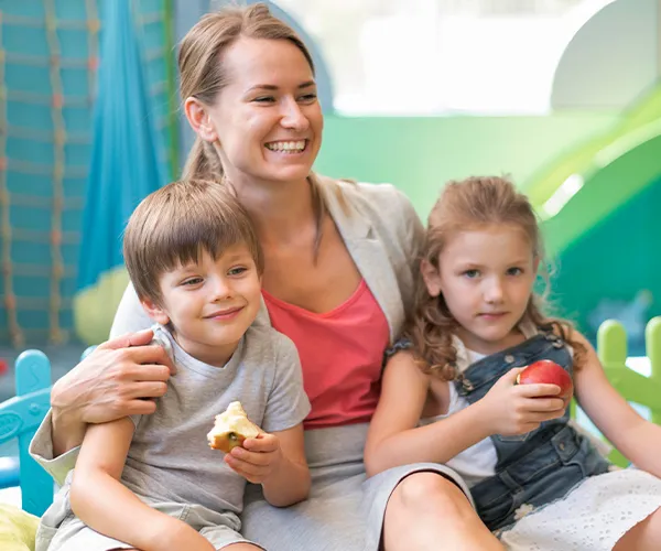 Happy kids playing in an indoor amusement park