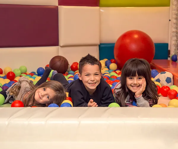 Kids engaged in a group activity at Kiztopia