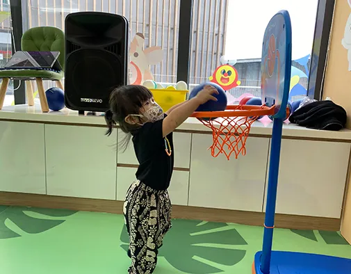 Child balancing on a fun obstacle course
