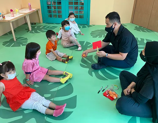 Children practicing physical skills in a play area