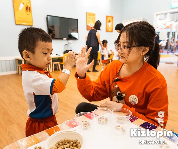 Kids enjoying a playful moment in a themed play area, emphasizing fun and exploration